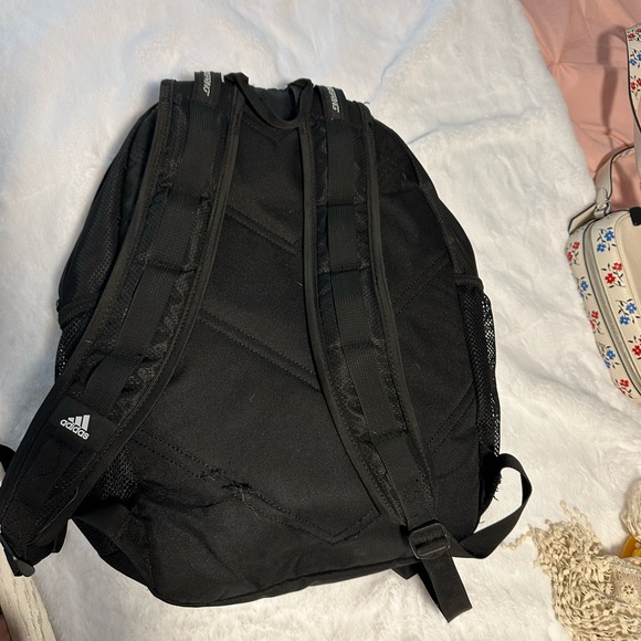 Black adidas backpack. Lots of space inside. Many pockets and can hold a lot. - Picture 2 of 3